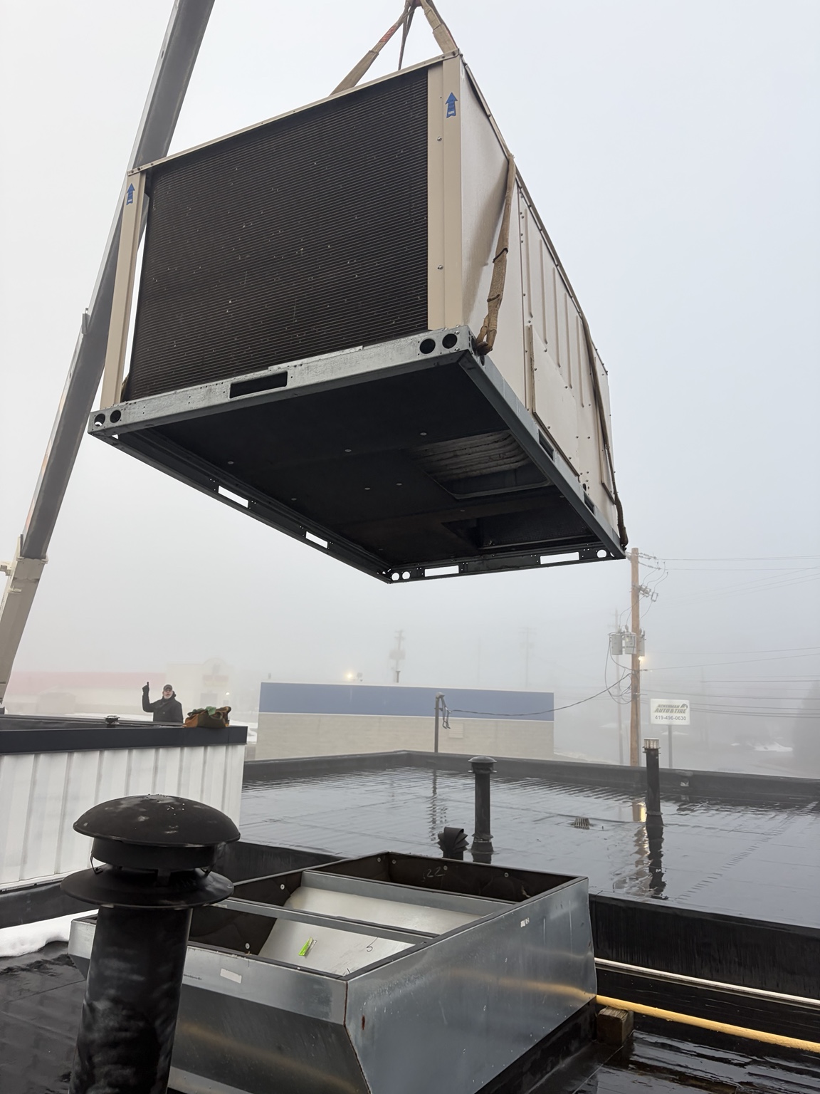 Commercial rooftop unit crane installation
